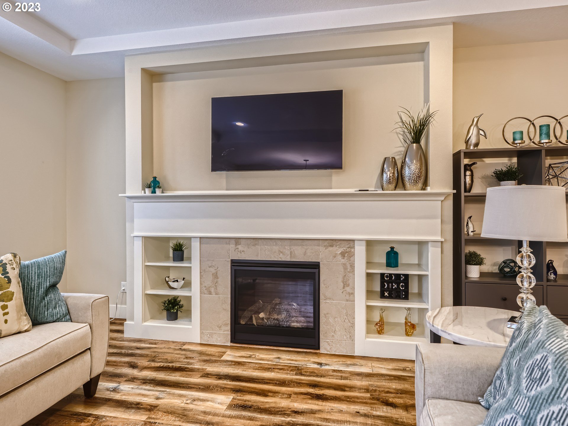 11469 Southwest Gabriel Street Tigard, OR 97224 - Photo 9 of 25 a living room with furniture and a fireplace