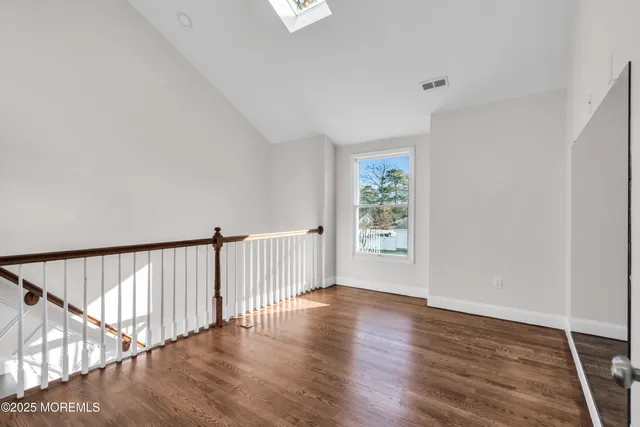 a view of entryway with wooden floor