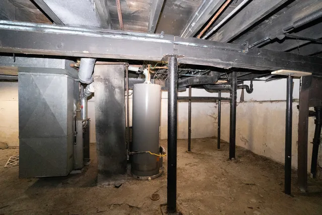 a view of a house with backyard sitting area and garden