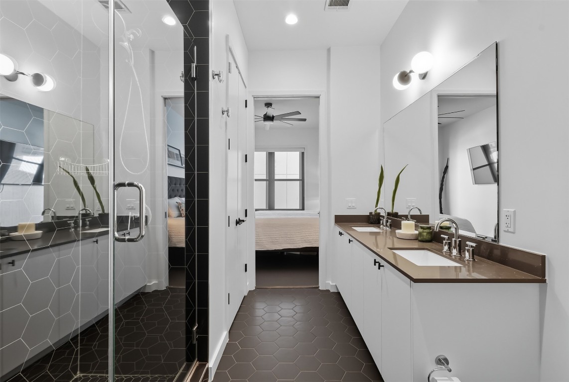800 Embassy Drive, Unit 320 Austin, TX 78702 - Photo 9 of 23 a kitchen with a sink stove and refrigerator
