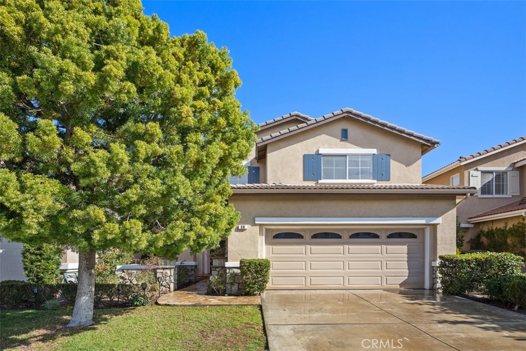 39 Ohio Irvine, CA 92606 - Photo 1 of 46 a front view of a house with a garden