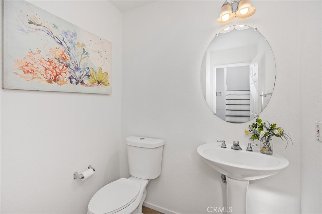 39 Ohio Irvine, CA 92606 - Photo 17 of 46 a bathroom with a toilet sink and mirror