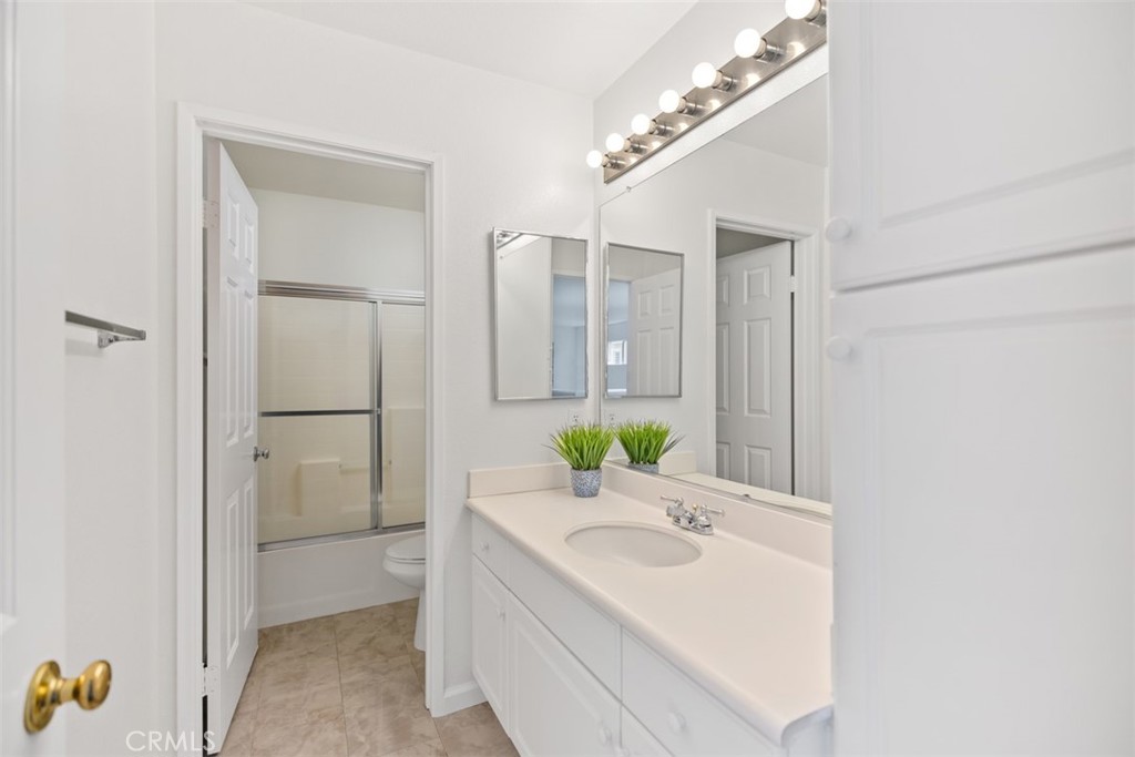 39 Ohio Irvine, CA 92606 - Photo 22 of 46 a bathroom with a sink and a mirror