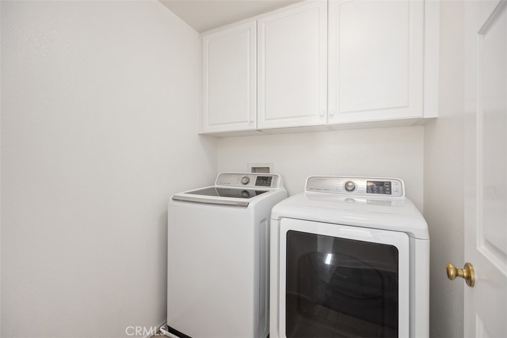 39 Ohio Irvine, CA 92606 - Photo 23 of 46 a utility room with dryer and washer