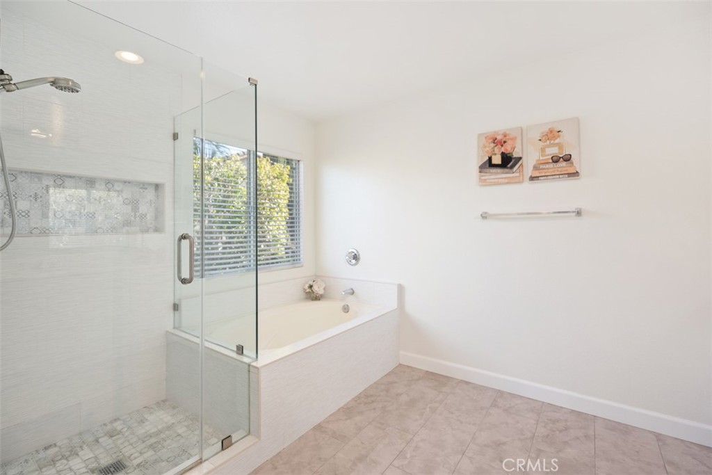 39 Ohio Irvine, CA 92606 - Photo 30 of 46 a bathroom with a tub a sink and shower