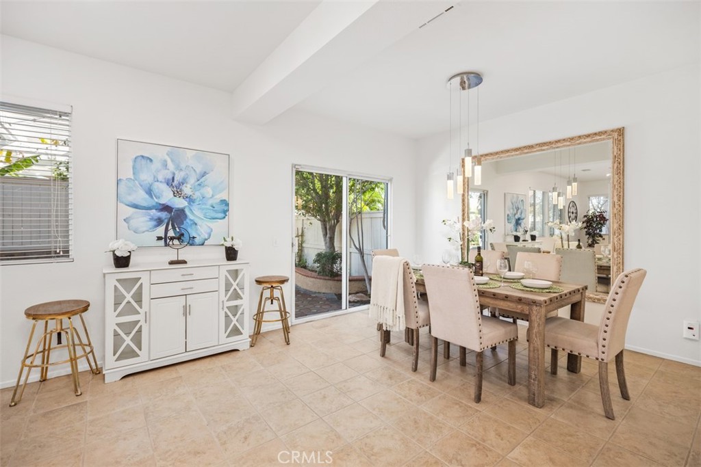 39 Ohio Irvine, CA 92606 - Photo 9 of 46 a view of a dining room with furniture and a large window