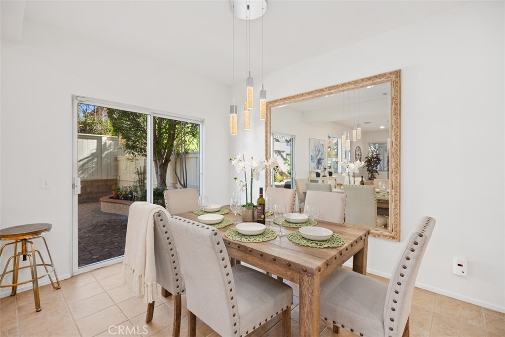39 Ohio Irvine, CA 92606 - Photo 10 of 46 a view of a dining room with furniture window and outside view