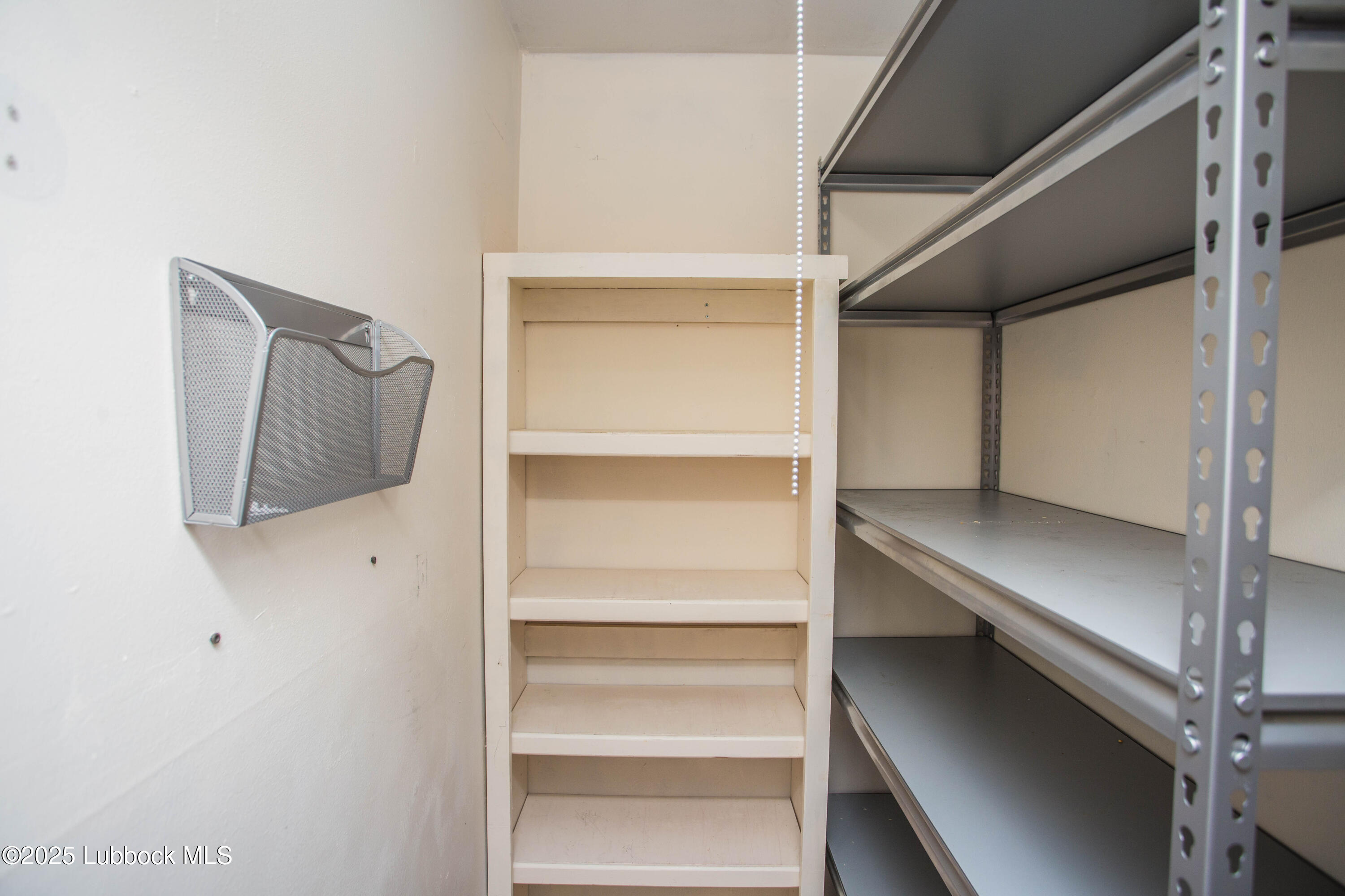 5424 31st Street Lubbock, TX 79407 - Photo 18 of 45 a view of walk in closet