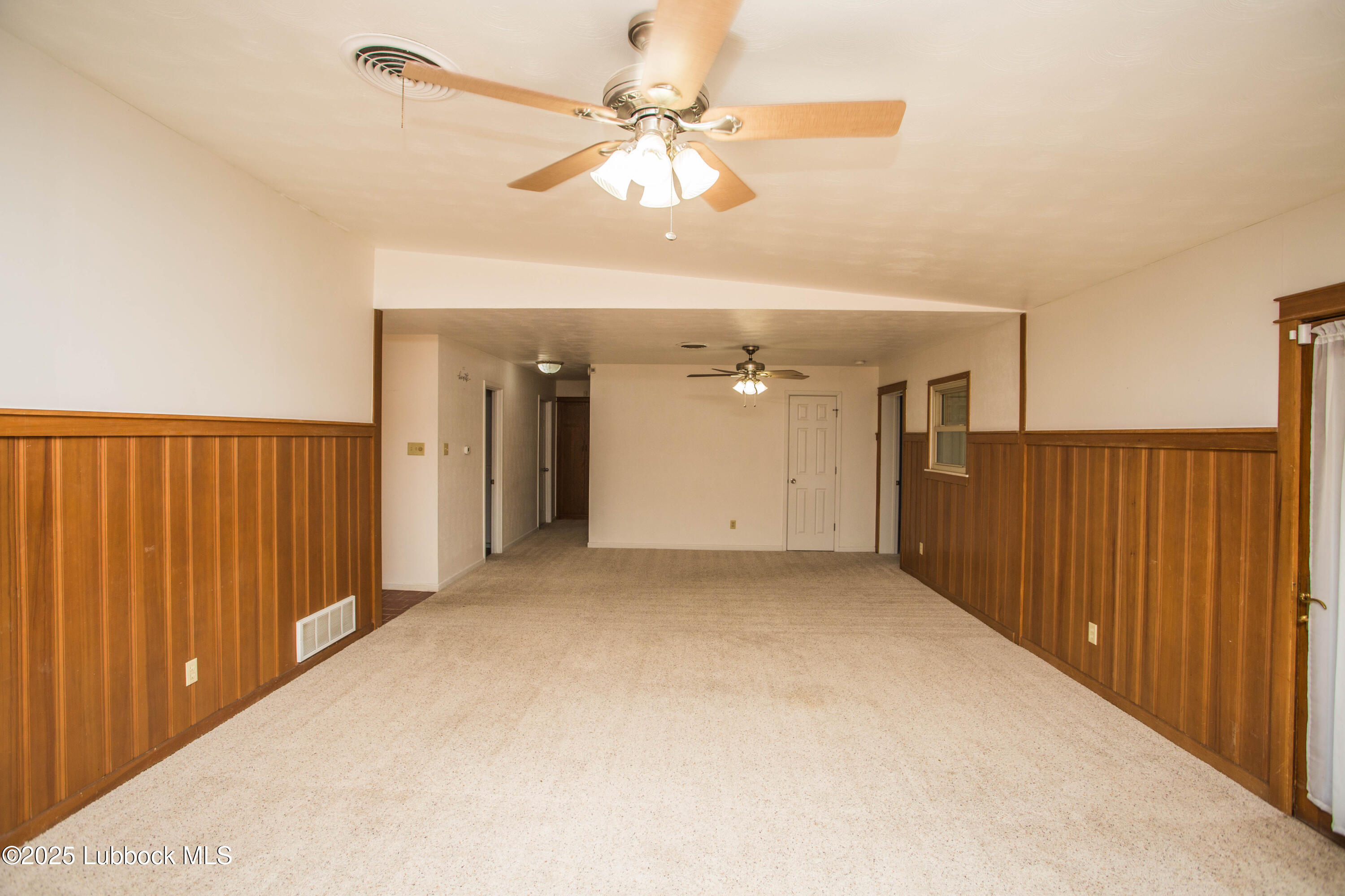 5424 31st Street Lubbock, TX 79407 - Photo 19 of 45 wooden floor in an empty room