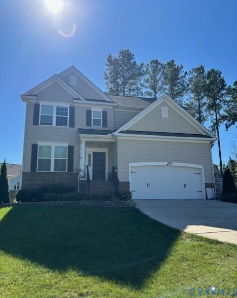 15513 Wolfboro Road Chesterfield, VA 23832 - Photo 1 of 23 a front view of a house with a garden