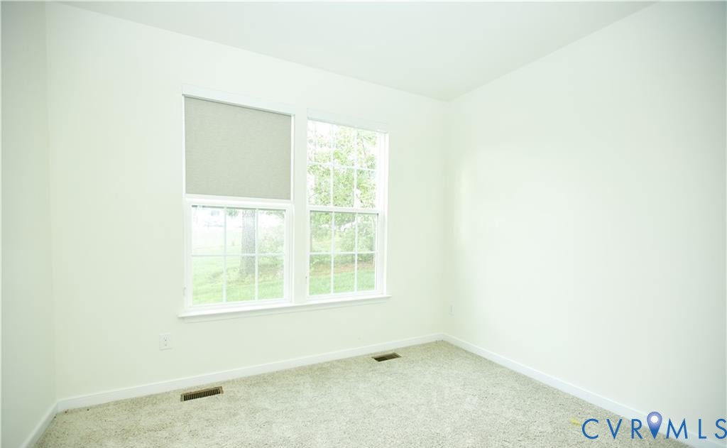 15513 Wolfboro Road Chesterfield, VA 23832 - Photo 19 of 23 an empty room with a window