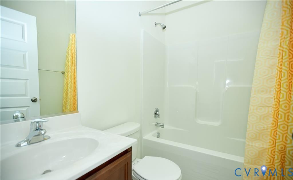 15513 Wolfboro Road Chesterfield, VA 23832 - Photo 20 of 23 a bathroom with a sink toilet and shower