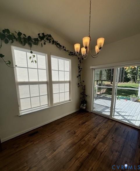 15513 Wolfboro Road Chesterfield, VA 23832 - Photo 7 of 23 a view of an empty room with a window and wooden floor
