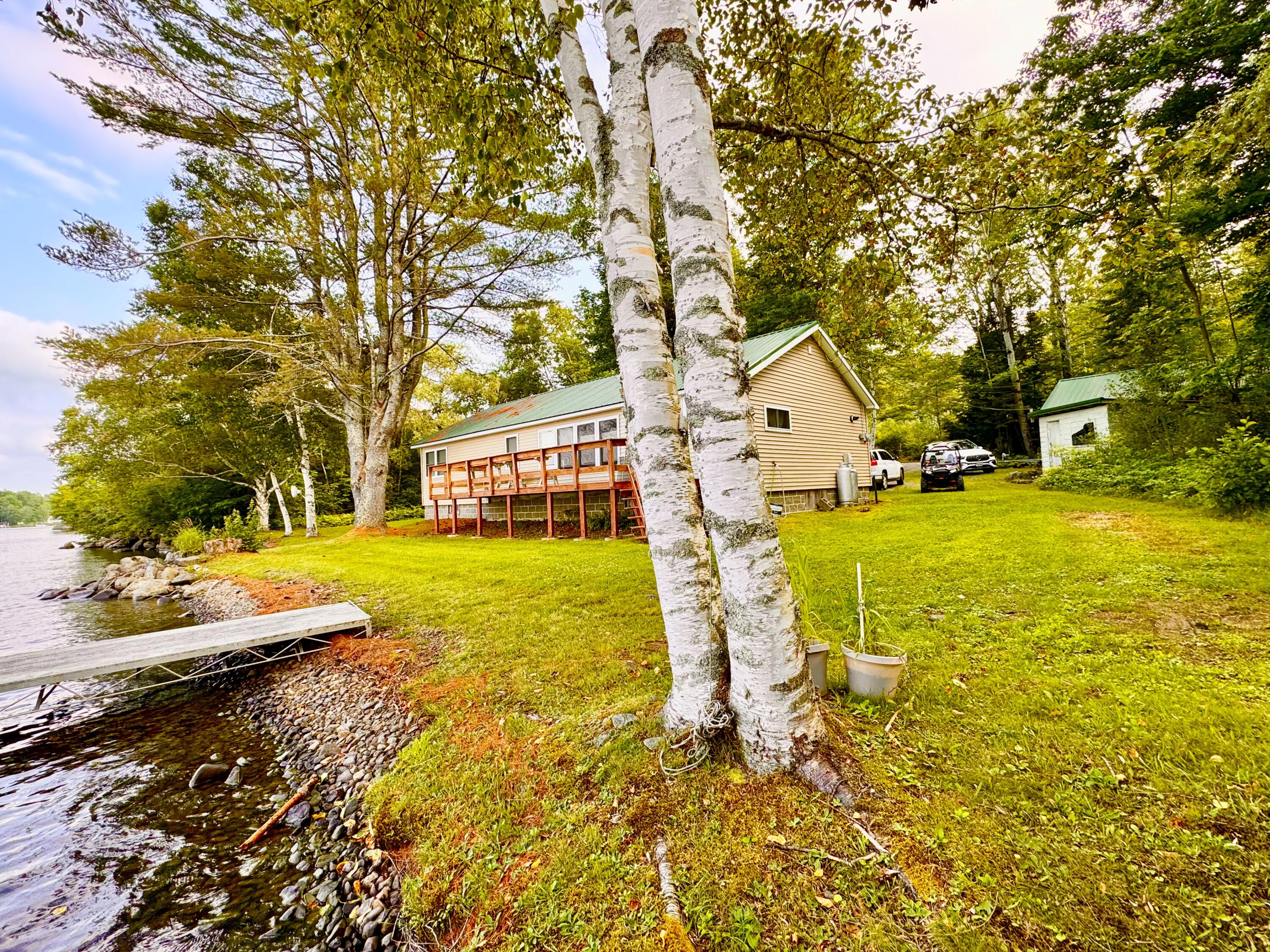 1 Spool Yard Road Milo, ME 04463 - Photo 12 of 165 200' Prime Lake Frontage