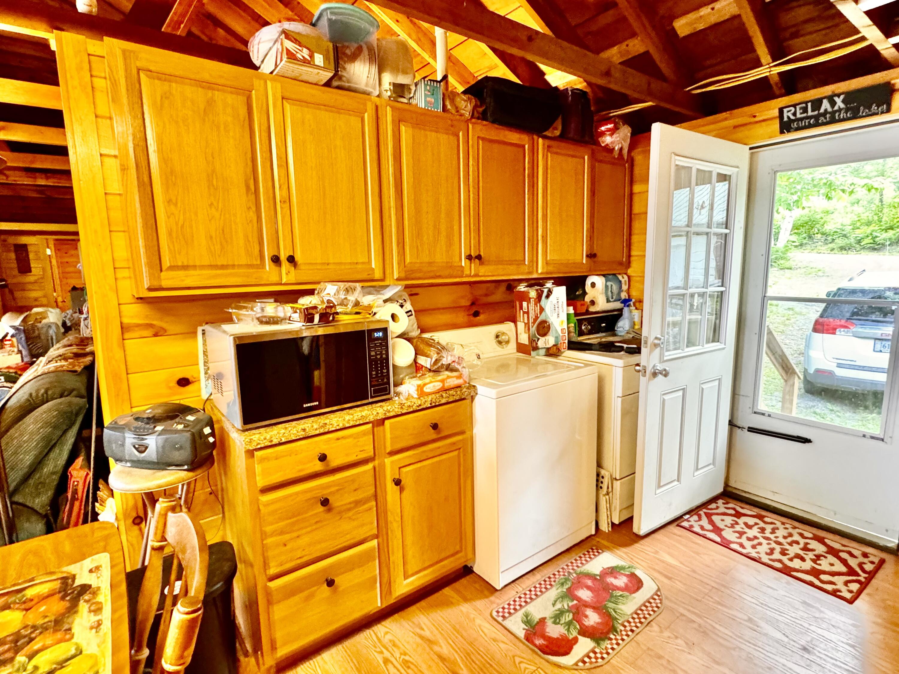 1 Spool Yard Road Milo, ME 04463 - Photo 55 of 165 Door to Driveway