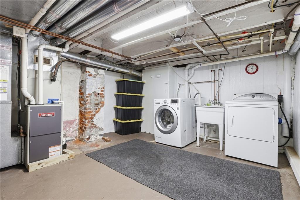187 42nd Street Pittsburgh, PA 15201 - Photo 22 of 26 a utility room with dryer and washer