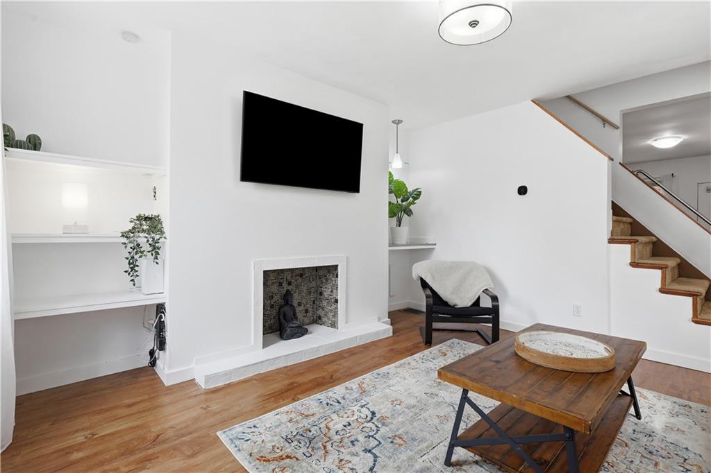 187 42nd Street Pittsburgh, PA 15201 - Photo 3 of 26 a living room with furniture and a flat screen tv