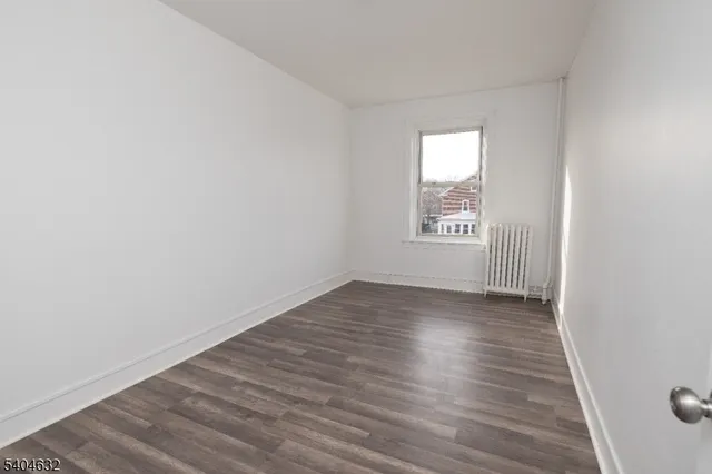 a bathroom with a bathtub and a toilet