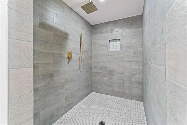 a bathroom with a sink a mirror and a toilet