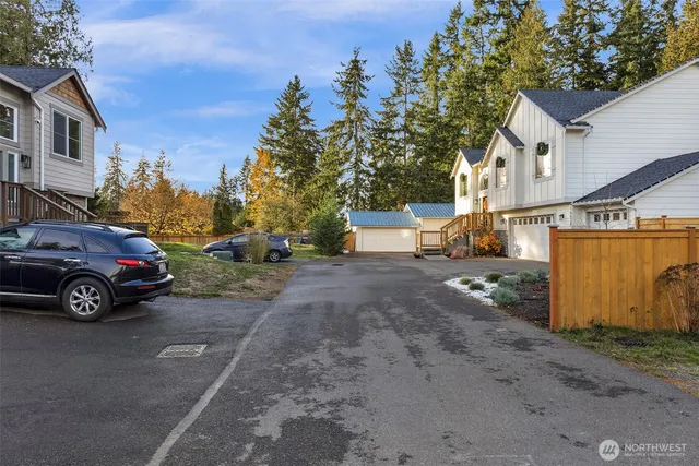 a view of street with parked cars