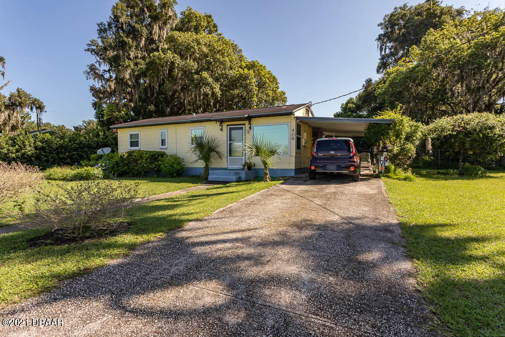 406 Grand Rondo East Crescent City, FL 32112 - Photo 2 of 27 1-01-406-Grand-Rondo-RAW-2673-copy