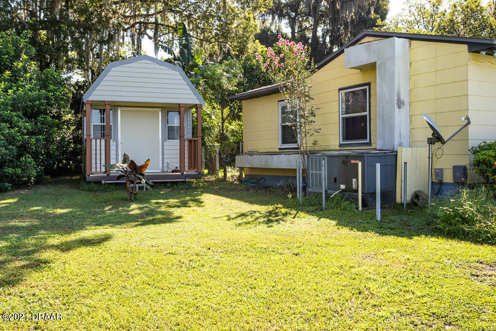 406 Grand Rondo East Crescent City, FL 32112 - Photo 3 of 27 5-05-406-Grand-Rondo-RAW-2665-copy