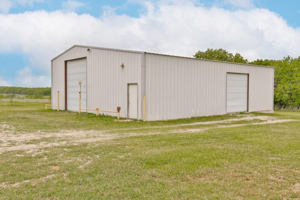 4316 Leona Road Bowie, TX 76230 - Photo 25 of 37 a view of a house with a outdoor space