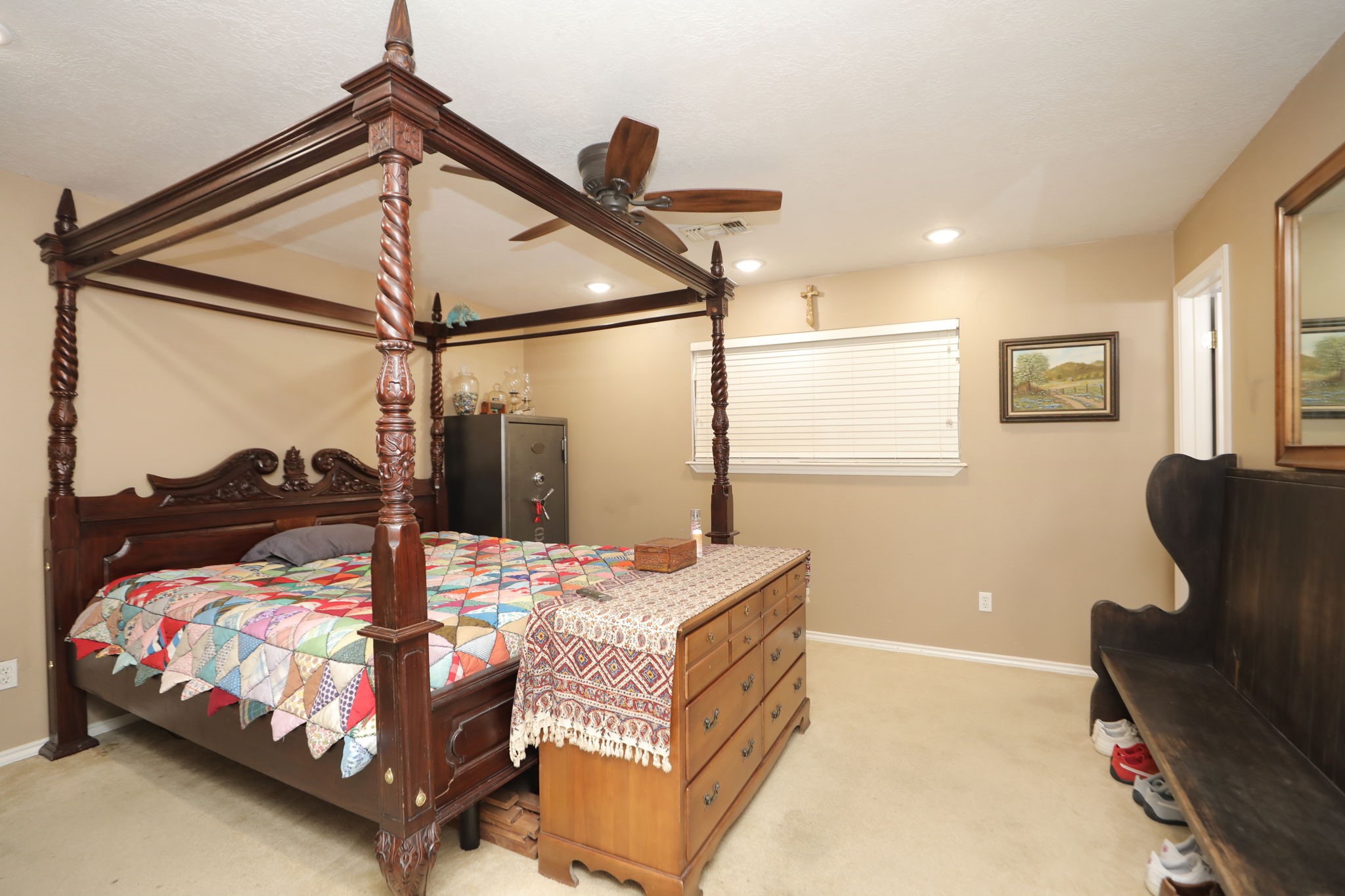 9810 Sugar Tree Court Houston, TX 77070 - Photo 13 of 30 a bedroom with a bed window and dresser