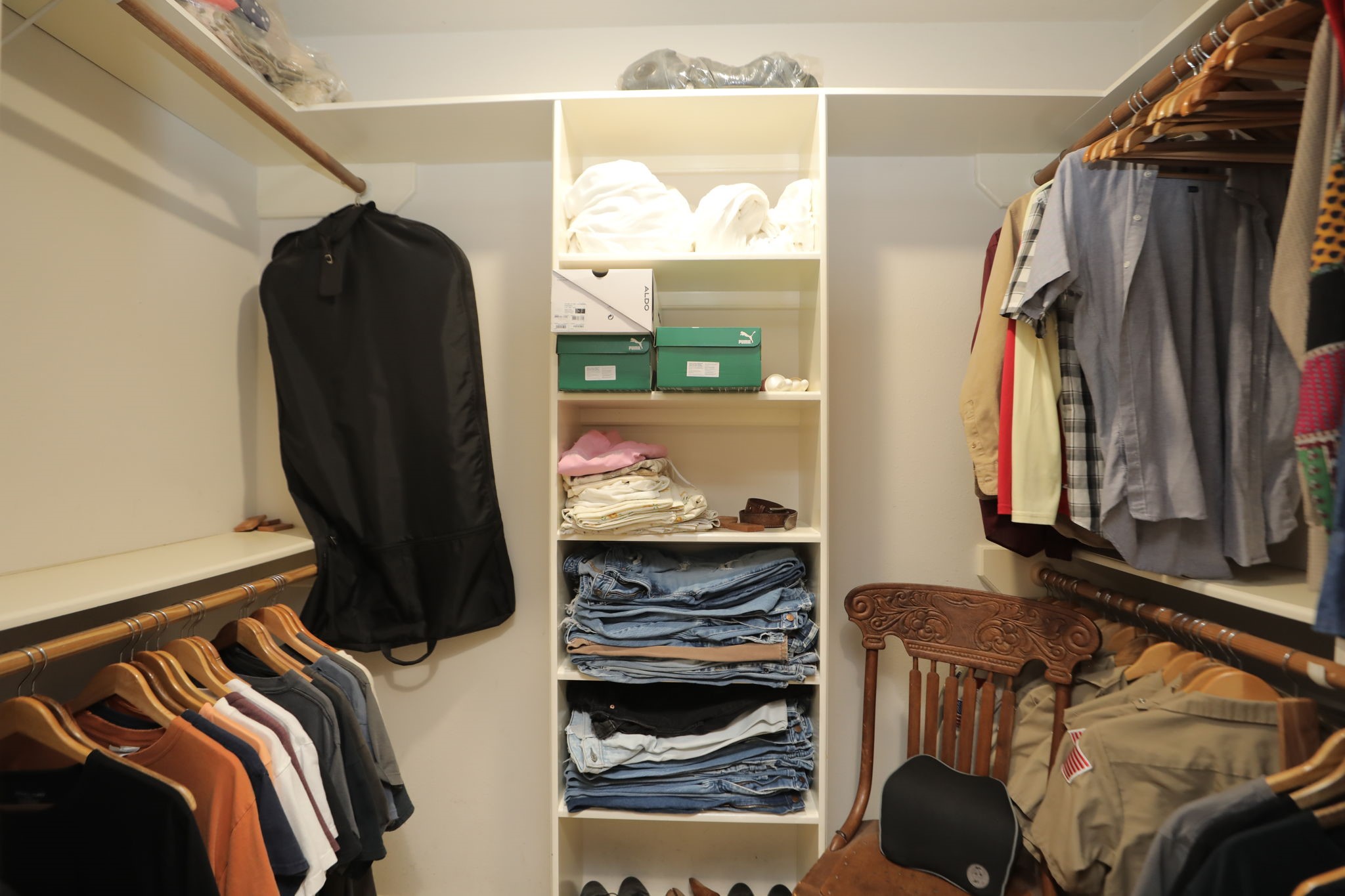 9810 Sugar Tree Court Houston, TX 77070 - Photo 17 of 30 a view of walk in closet with clothes and shoes