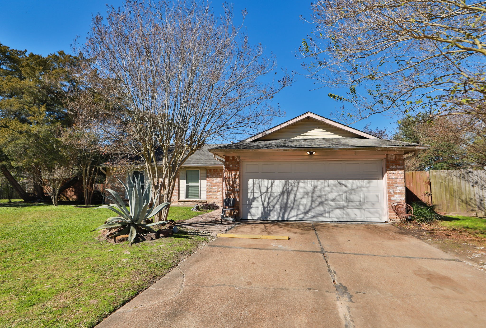 9810 Sugar Tree Court Houston, TX 77070 - Photo 2 of 30 a view of a house with a yard