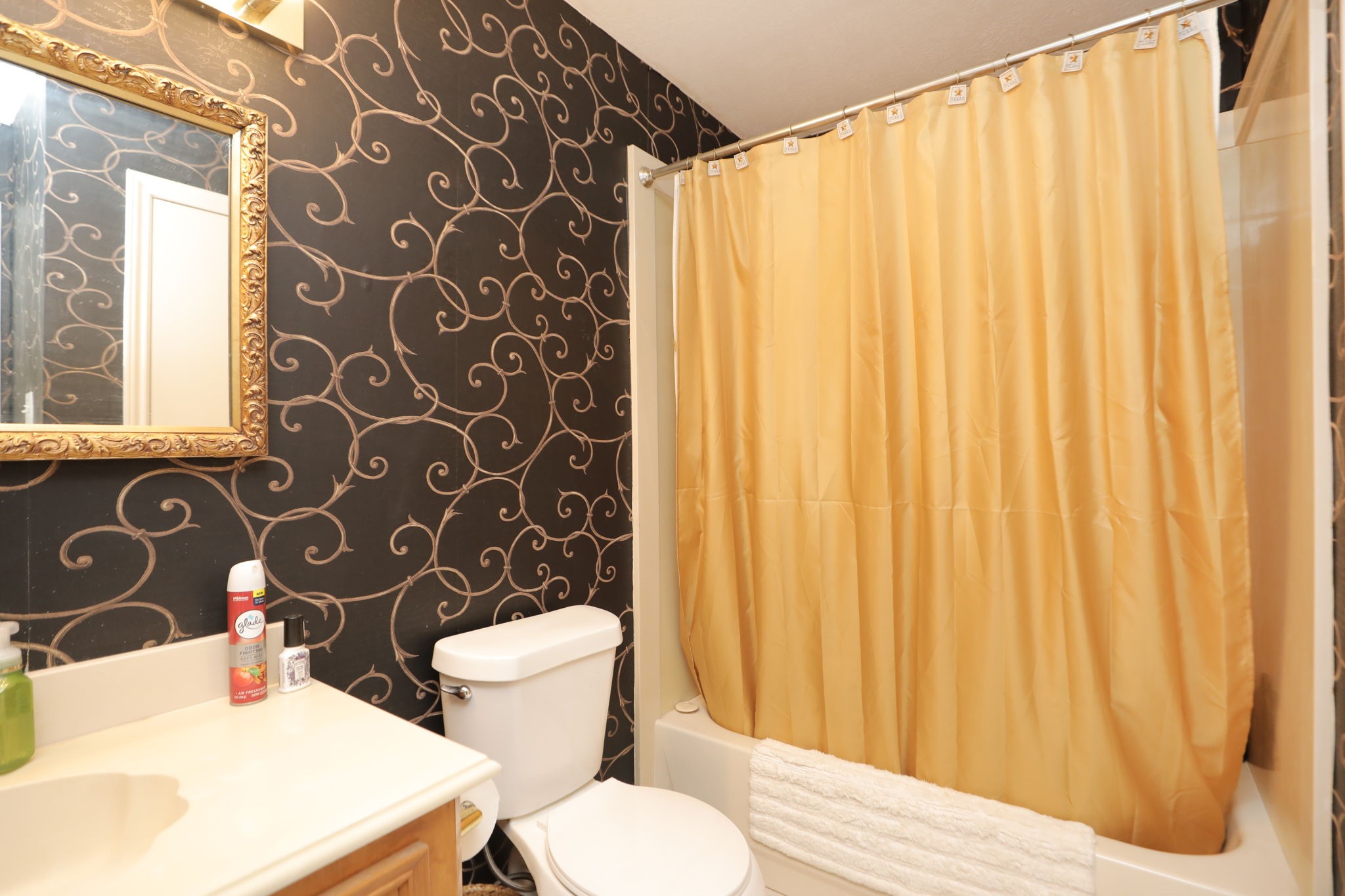 9810 Sugar Tree Court Houston, TX 77070 - Photo 22 of 30 a bathroom with a sink and a toilet