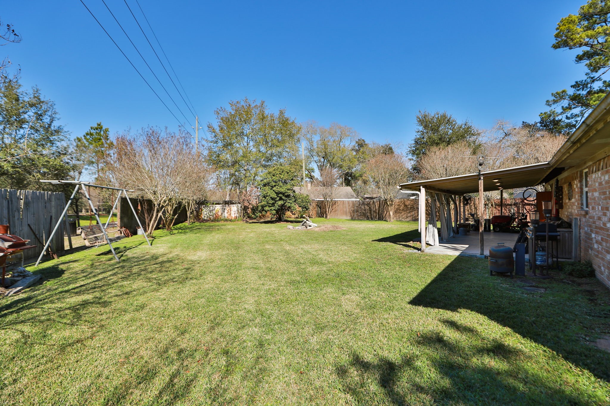 9810 Sugar Tree Court Houston, TX 77070 - Photo 24 of 30 a view of yard with swimming pool and sitting area