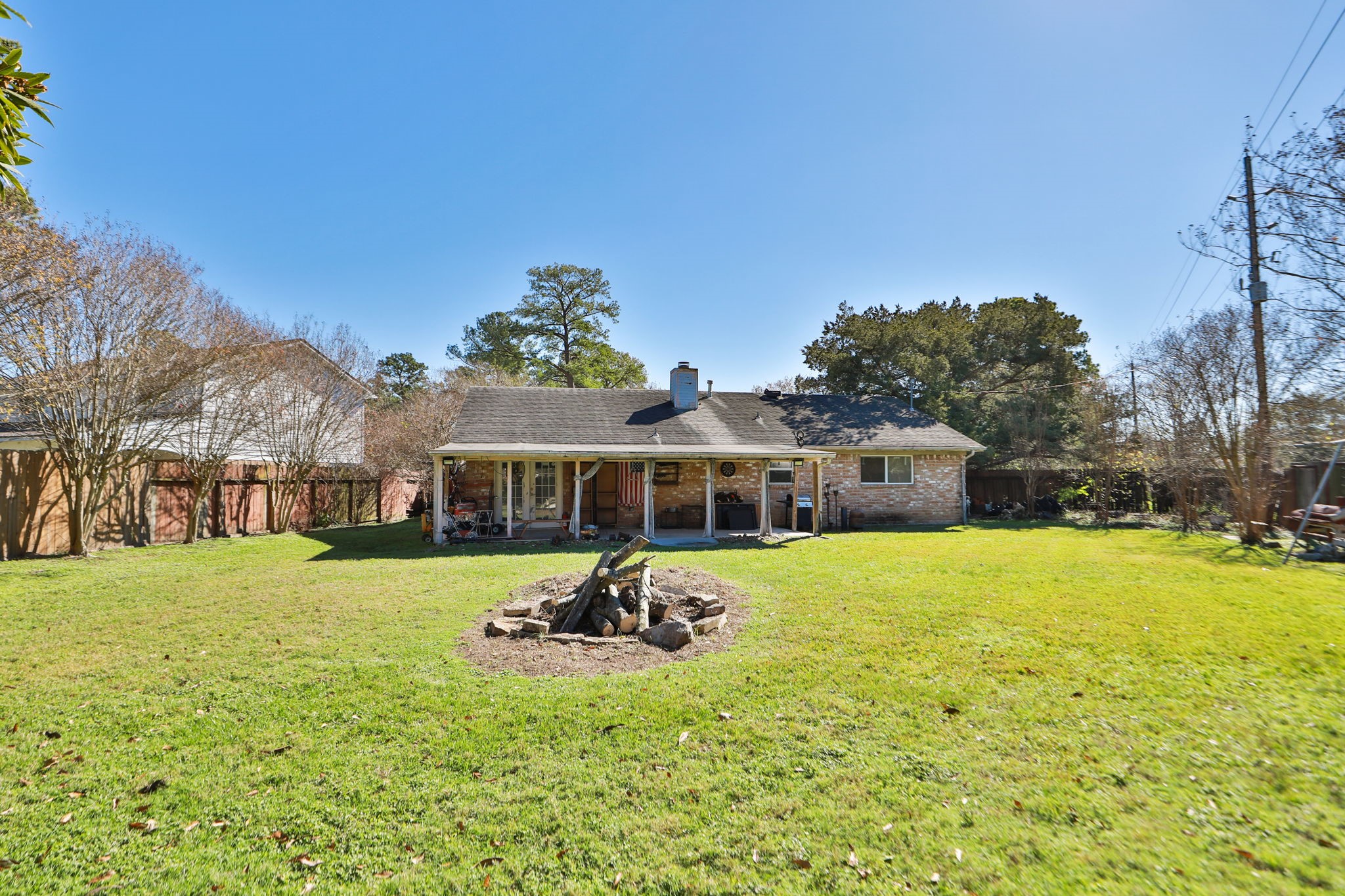 9810 Sugar Tree Court Houston, TX 77070 - Photo 26 of 30 a view of a house with a yard and trees
