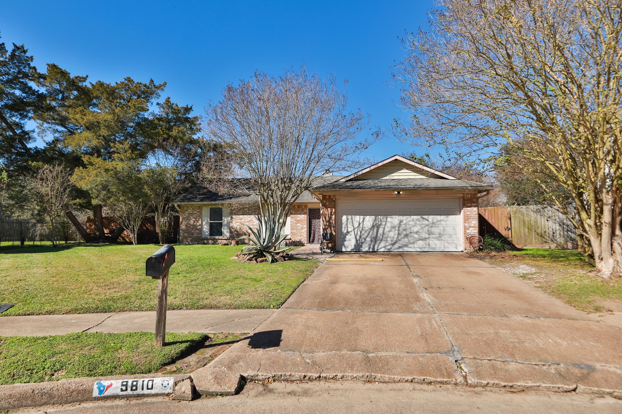9810 Sugar Tree Court Houston, TX 77070 - Photo 29 of 30 a front view of a house with garden
