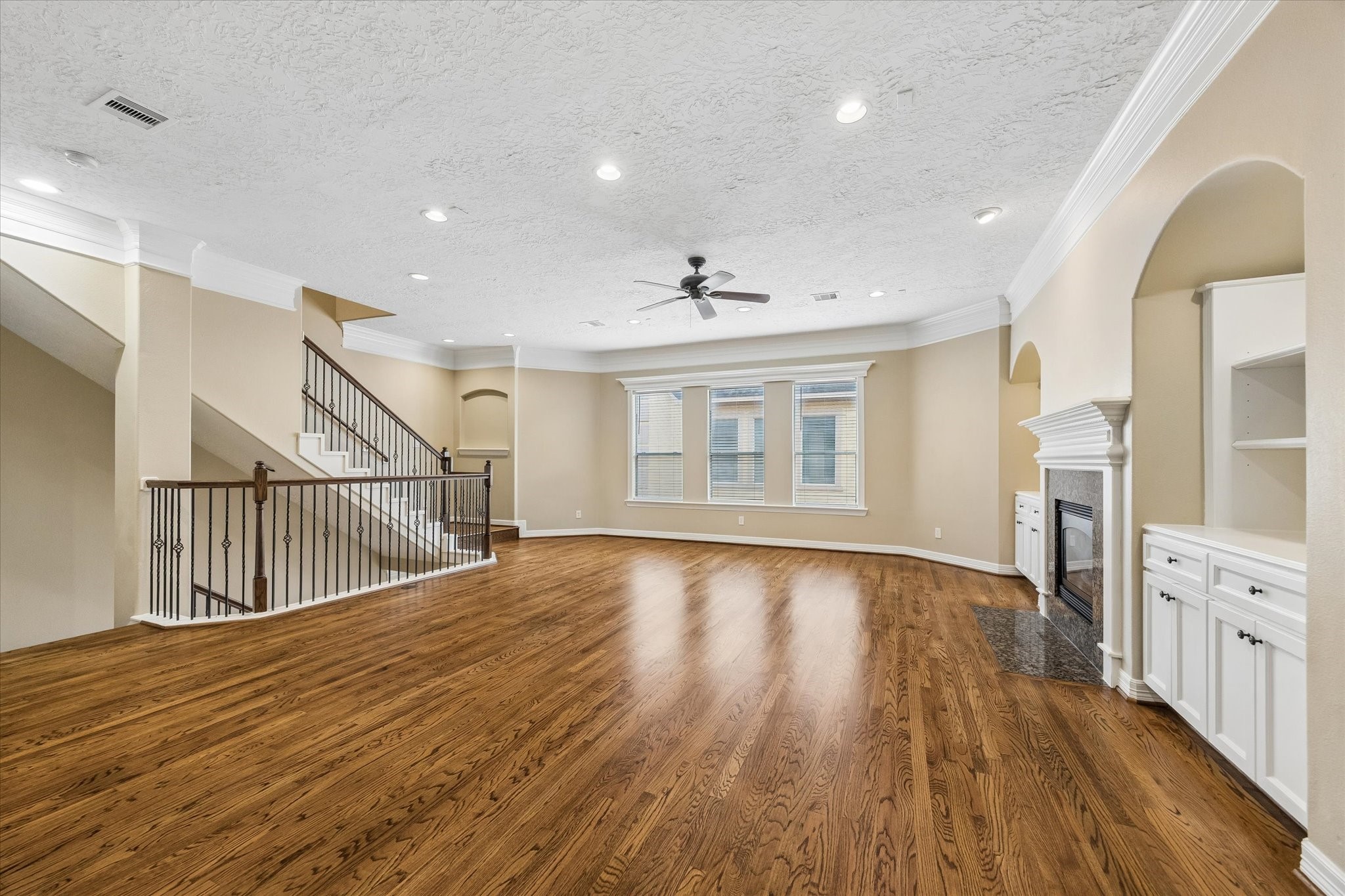 1417 Thompson Street Houston, TX 77007 - Photo 22 of 22 Open floorplan with custom built in cabinetry, offers a lot of options and natural light