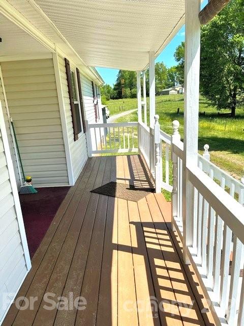 369 Cedar Grove Road Clover, SC 29710 - Photo 3 of 32 a view of balcony with wooden floor and outdoor space
