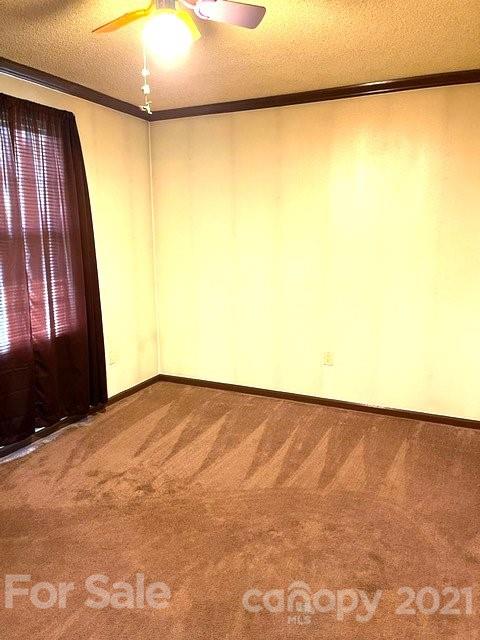 369 Cedar Grove Road Clover, SC 29710 - Photo 23 of 32 a view of an empty room and a window