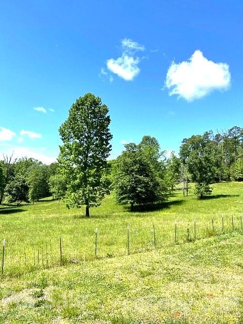 369 Cedar Grove Road Clover, SC 29710 - Photo 24 of 32 a view of a big yard with an outdoor space and seating