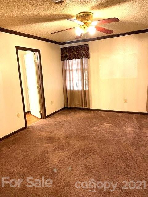 369 Cedar Grove Road Clover, SC 29710 - Photo 25 of 32 a view of an empty room and a window
