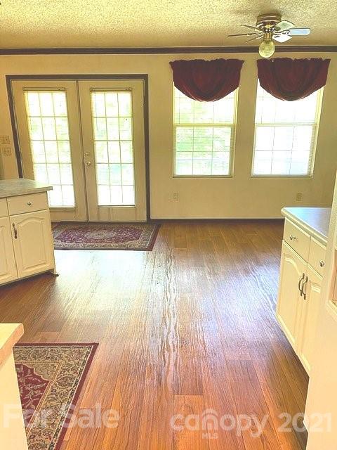 369 Cedar Grove Road Clover, SC 29710 - Photo 31 of 32 a view of a room with wooden floor and windows