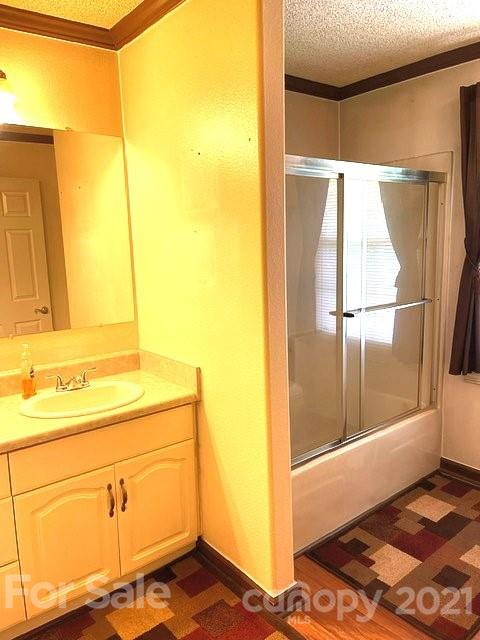 369 Cedar Grove Road Clover, SC 29710 - Photo 6 of 32 a bathroom with a sink and a mirror