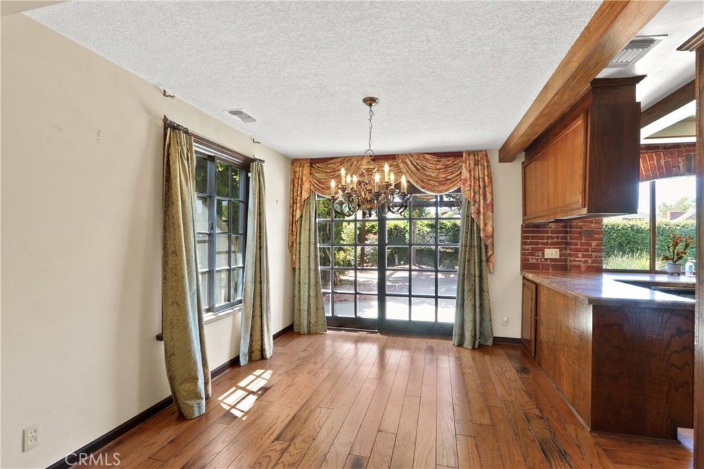 3142 Quail Run Road Rossmoor, CA 90720 - Photo 9 of 35 Dining room overlooking the backyard