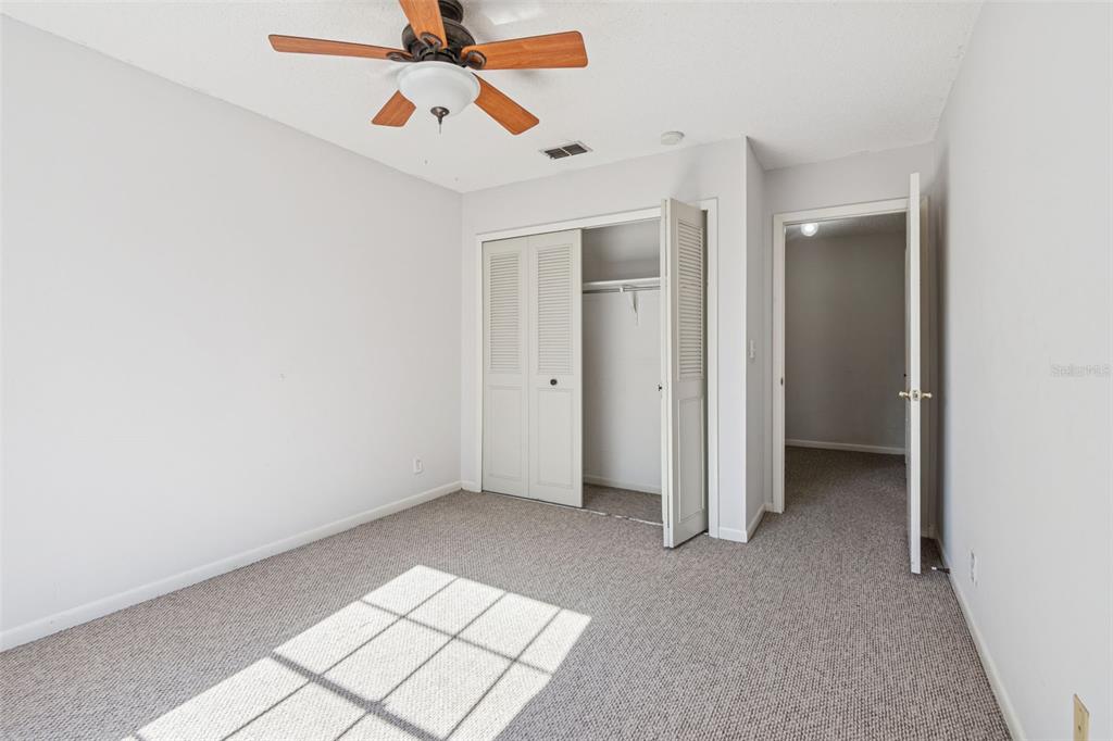 Undisclosed Address Temple Terrace, FL 33617 - Photo 17 of 23 an empty room with fan