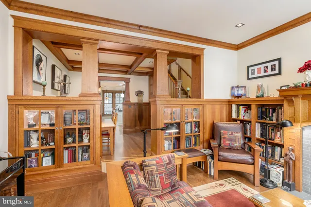 a living room with furniture fireplace and flat screen tv