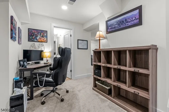 a view of a workspace with furniture
