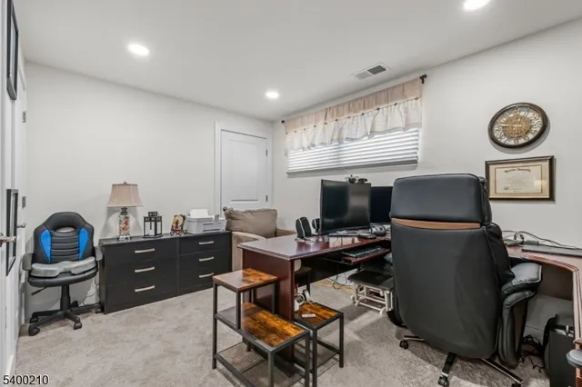 a workspace with furniture and window