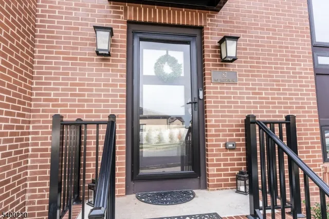 a view of a door and a window