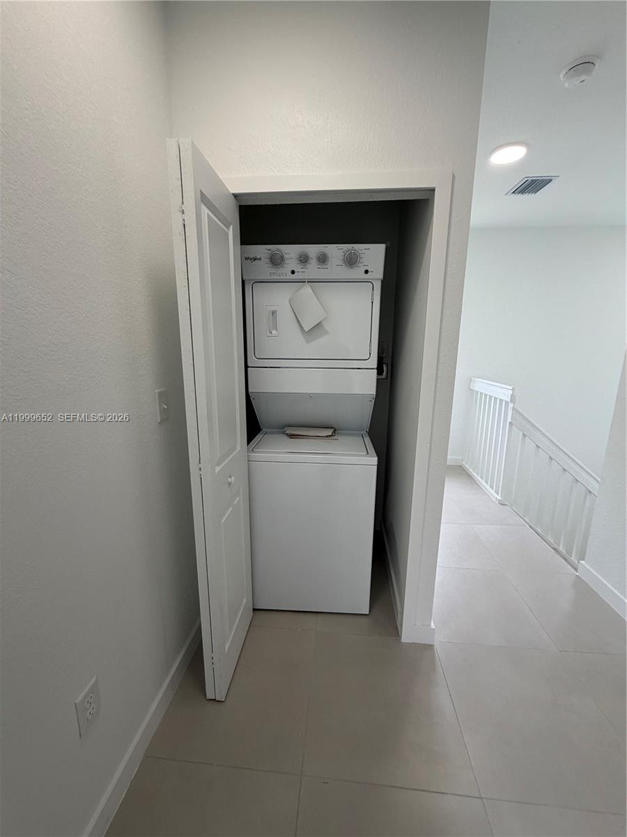 8034 Northwest 14th Place, Unit 8034 Miami, FL 33147 - Photo 10 of 14 a utility room with dryer and washer