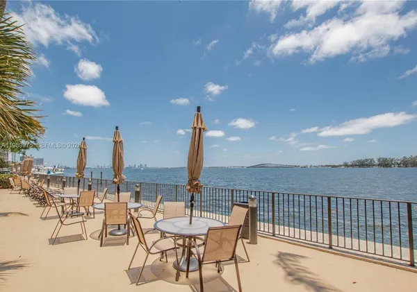 a view of a terrace with furniture
