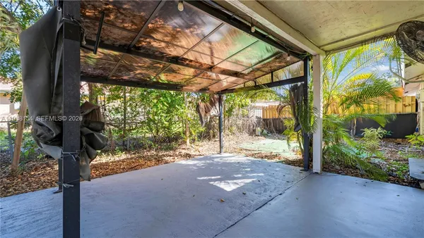 a view of a house with a small garden